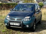 a picture of a car parked in a field