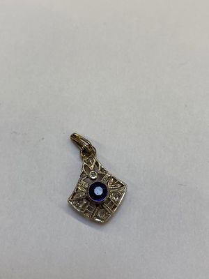Pendentif en or jaune et argent sertissant des diamants et u…