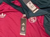 a close up of a shirt with a tag on it