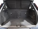 a trunk of a car with the doors open
