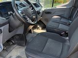 a view of the inside of a van from the driver ' s seat