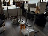 a room with a lot of bottles of alcohol on the floor