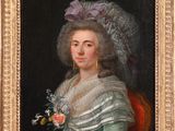 portrait of a lady in a green dress with a bouquet of flowers in her hand