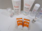 many different types of skin care products sitting on a counter