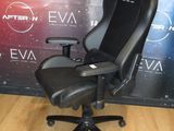 the office chair is black and has a black seat on it