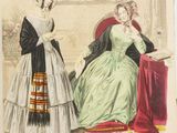 an old fashion plate of two women in dresses sitting on a red chair