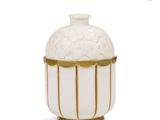 an image of a white vase with gold trimmings on it
