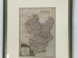 une vieille carte de l'Irlande encadrée, accrochée au mur