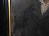 portrait of a man in a black coat and a white shirt