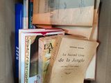 a box full of books that are sitting on a table