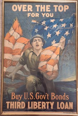 affiche représentant un soldat tenant un drapeau américain, avec en surimposition le texte « Achetez des obligations d'État américaines – Troisième emprunt de la Liberté »
