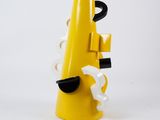 a yellow cone that has a black handle on it
