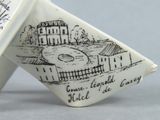 two cups that have drawings on them on them