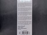 a close up of the back of a black plastic bag with a label on it