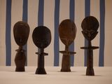 several wooden spoons and spoon spoons are lined up on a table