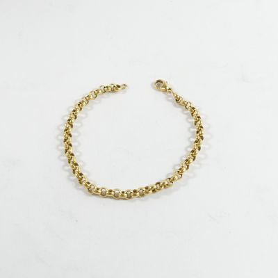 le bracelet orné de perles dorées