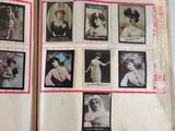 an open book with a bunch of photos of women on it