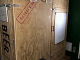 a refrigerator that is sitting in the middle of a room