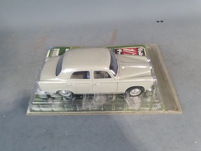 a toy car that is sitting on top of a plastic tray
