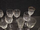 a lot of empty wine glasses sitting on a table