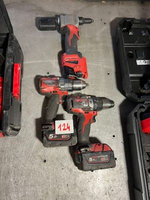 two tools that are sitting on the floor