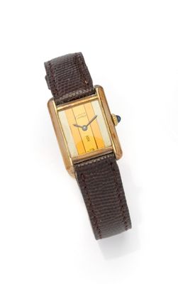an image of a gold plated wrist watch with a brown leather strap