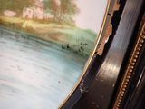 a picture of a painting on the wall of a room