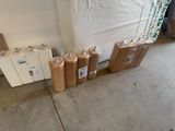 a lot of boxes and a suitcase sitting on the floor