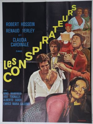 On voit l'affiche du film « Les cons cons ».