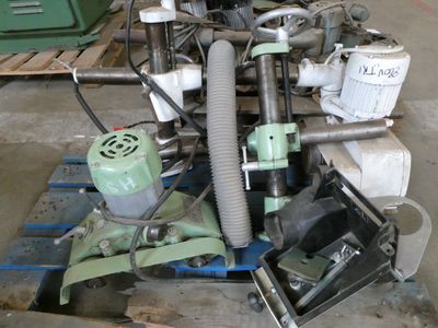 a machine that is sitting on a pallet in a warehouse