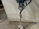 a machine that is sitting on the floor in a room