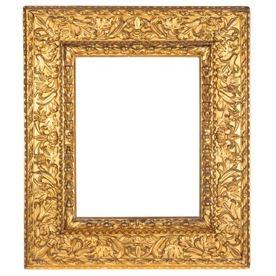 un cadre doré orné d'un motif décoratif sur fond blanc
