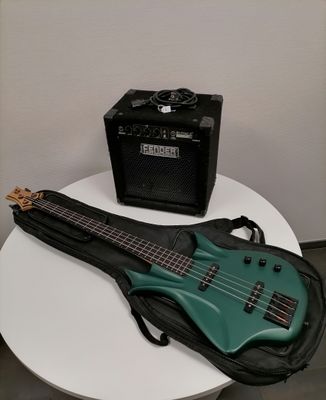 a guitar and a amp sitting on a table