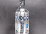 a bottle of water that is sitting on a table