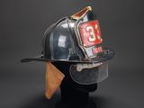 firefighters helmet with number 33 on the side and visor