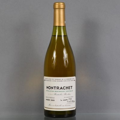 a bottle of wine that is sitting on a table