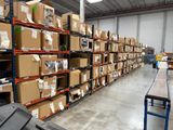 a large warehouse with lots of boxes on the shelves