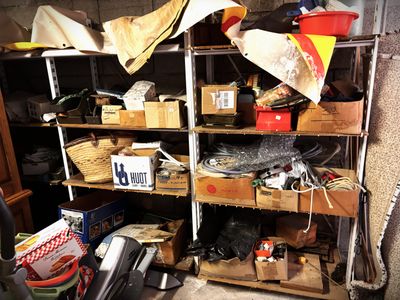 a room filled with lots of clutter and items