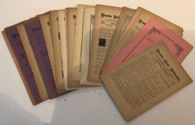 a lot of old books that are on a table