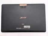 the back of a black laptop with a gold metal handle