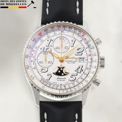 a close up of a watch with a black strap
