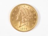 une pièce d'or ornée d'une tête de femme