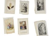 many cards with pictures of women on them on a white surface