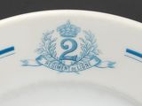 a plate with a blue and white design on it