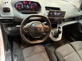 a dashboard of a car with a steering wheel and dashboard controls