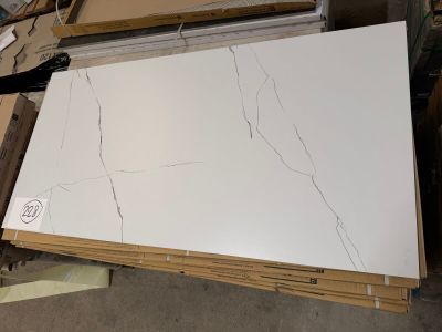 a lot of white marble slabs on the floor