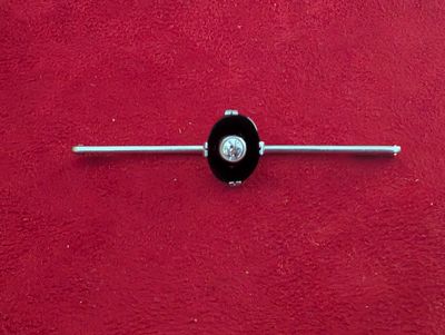 Broche barrette en or sertie d’onyx et d’un diamant taille a…