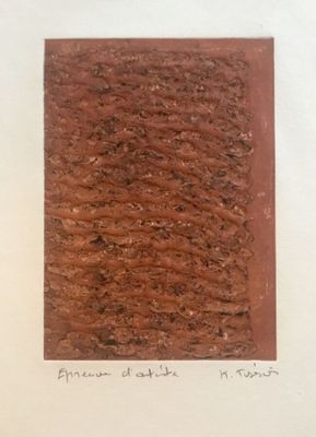 an image of a picture of a piece of art on a table