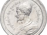 a close up of a silver coin with a man on it