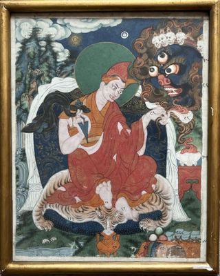 une image représentant un tableau où l'on voit une personne assise sur un tigre